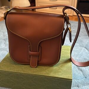 Coach Courier crossbody bag.